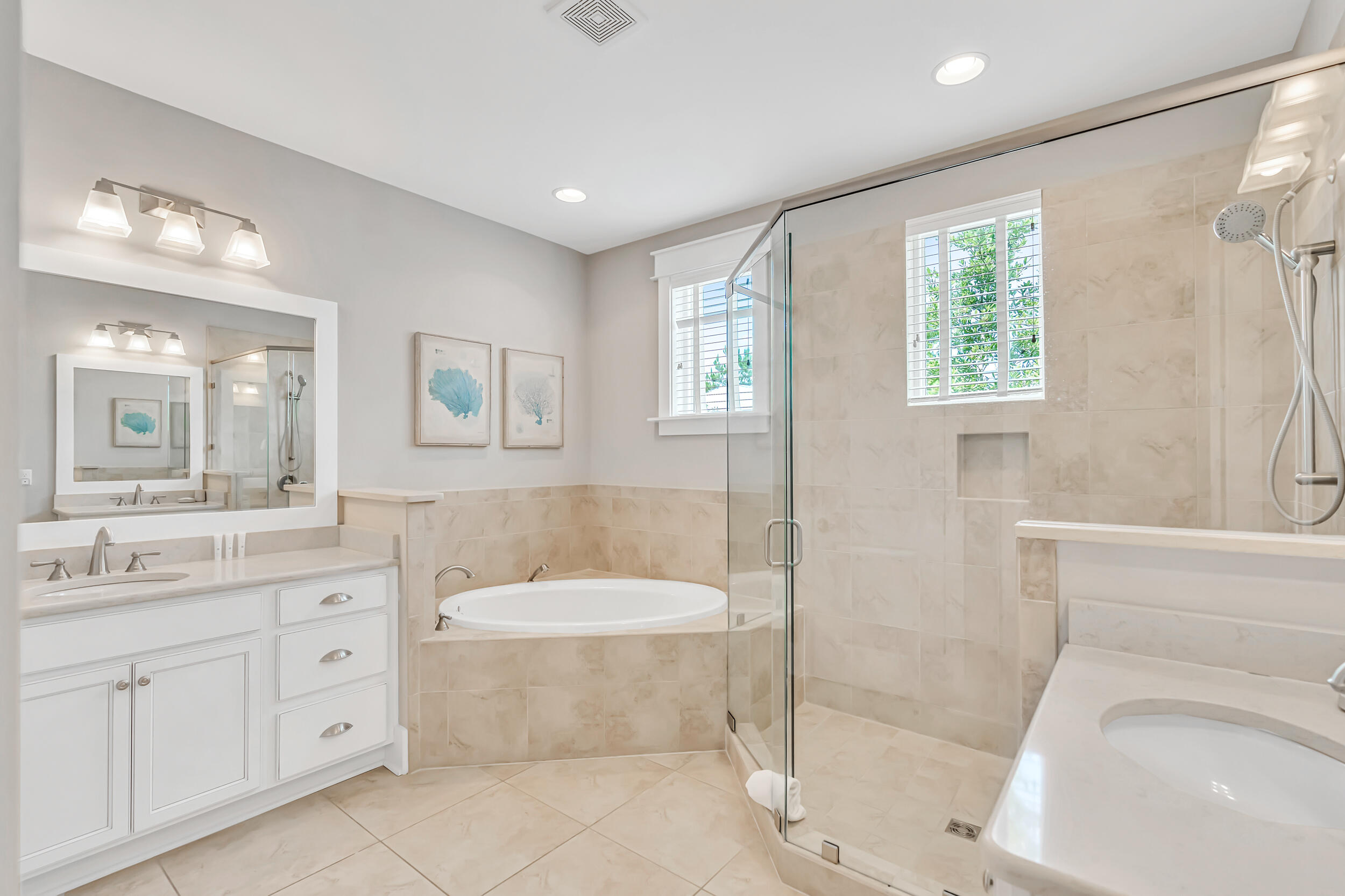 679 Flatwoods Forest Loop Santa Rosa Beach, FL 32459 - Photo 24 of 46 a spacious bathroom with a tub sink toilet and a shower