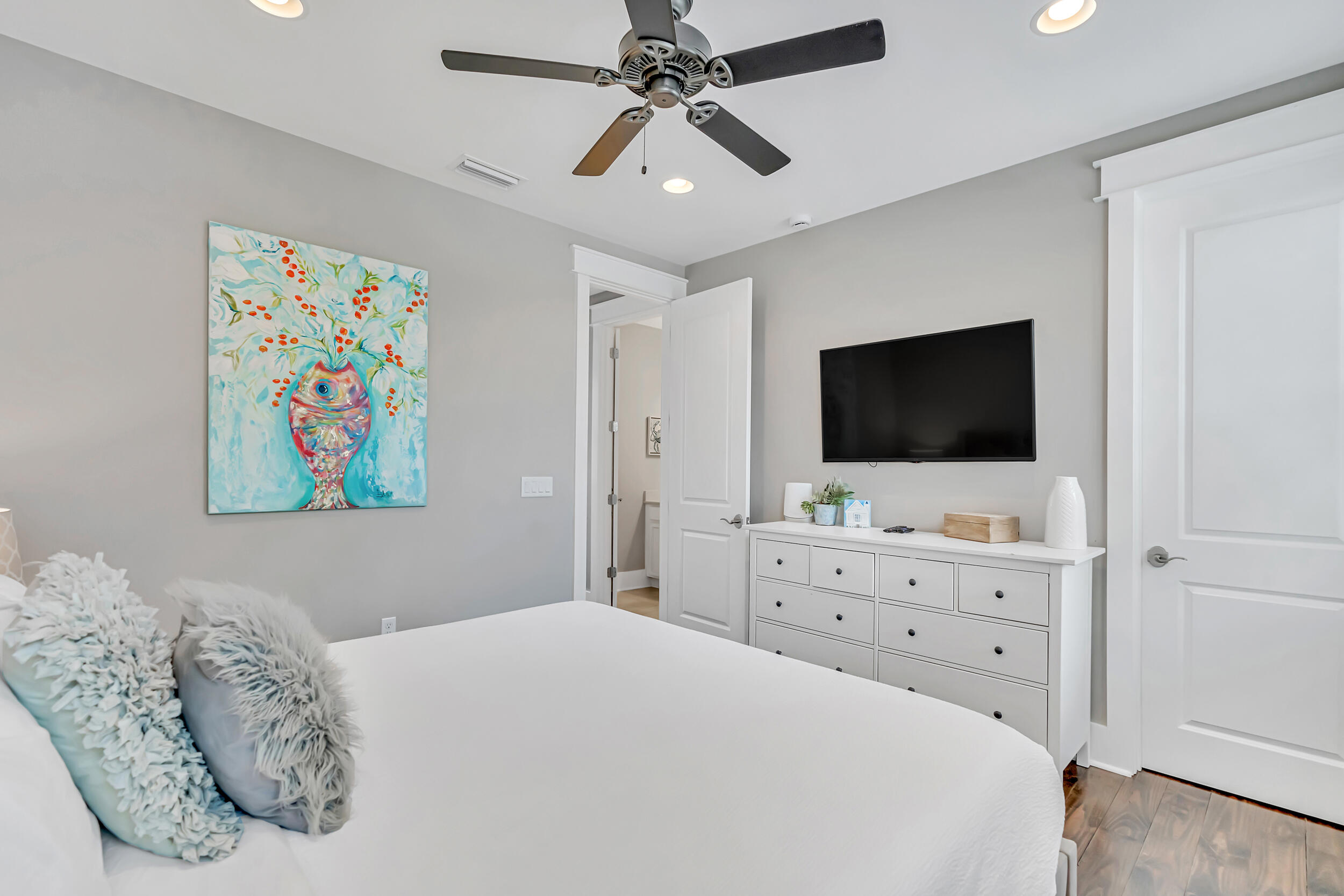 679 Flatwoods Forest Loop Santa Rosa Beach, FL 32459 - Photo 31 of 46 a bedroom with a bed and a flat screen tv