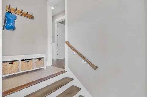 a view of entryway with wooden floor