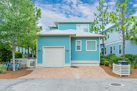 a front view of a house with a garage