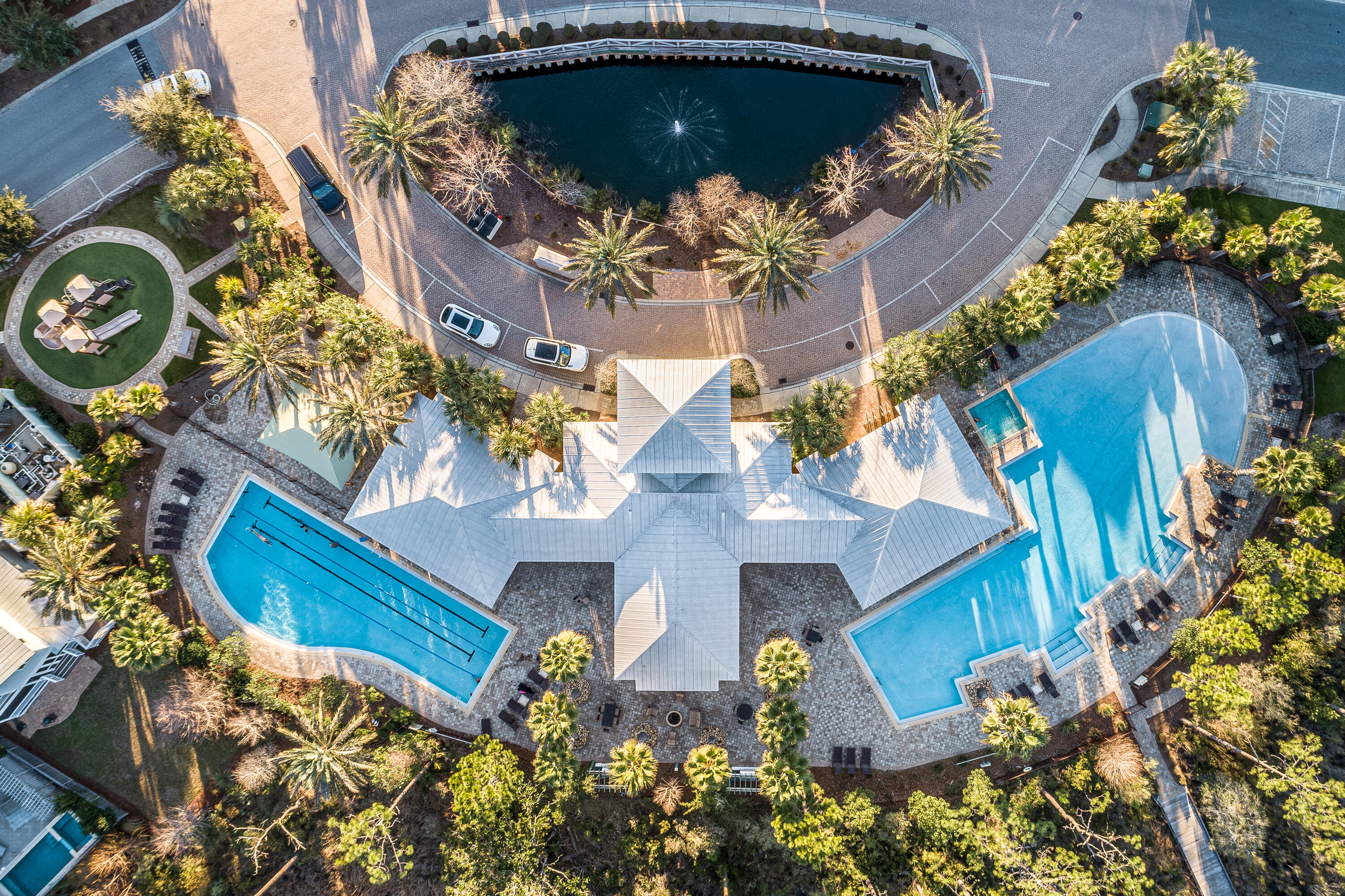 679 Flatwoods Forest Loop Santa Rosa Beach, FL 32459 - Photo 38 of 46 an aerial view of a house with a yard and garden