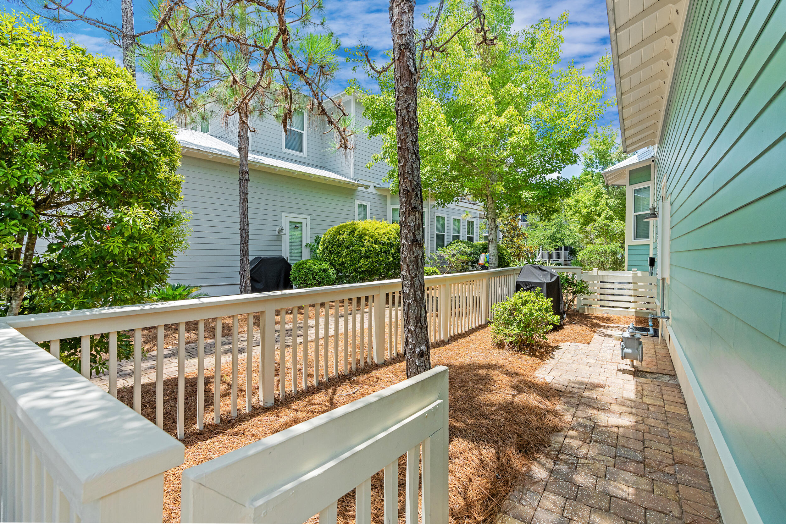 679 Flatwoods Forest Loop Santa Rosa Beach, FL 32459 - Photo 4 of 46 a view of a chair and table in the balcony
