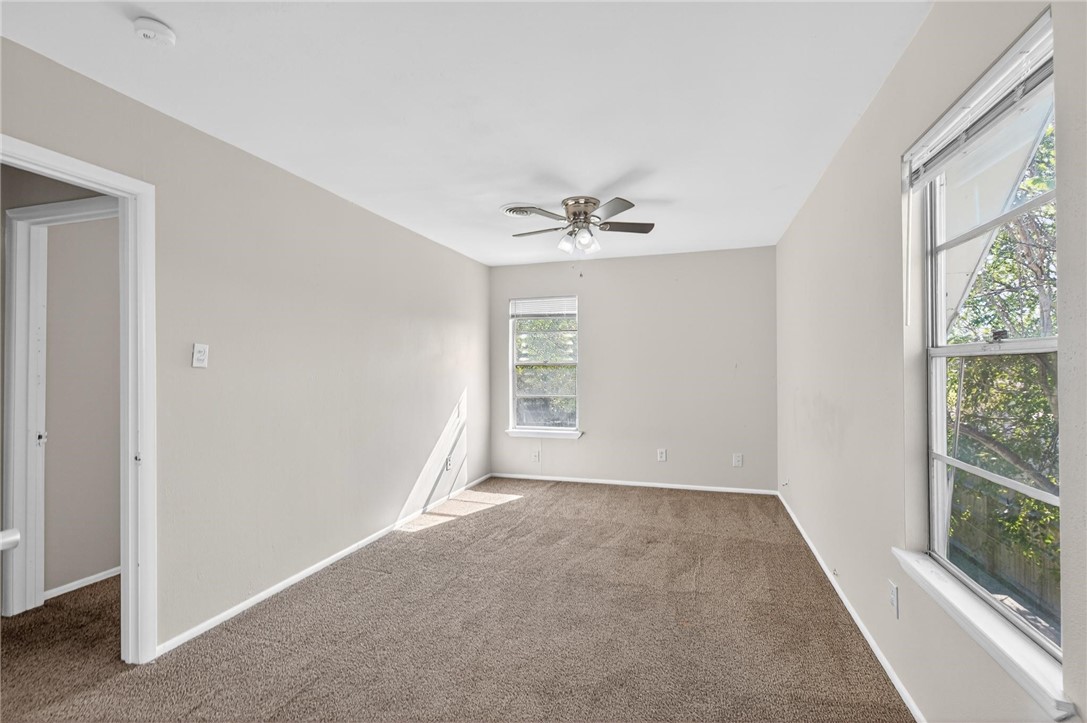 1104 Polaris Drive Portland, TX 78374 - Photo 16 of 39 a view of an empty room with a window