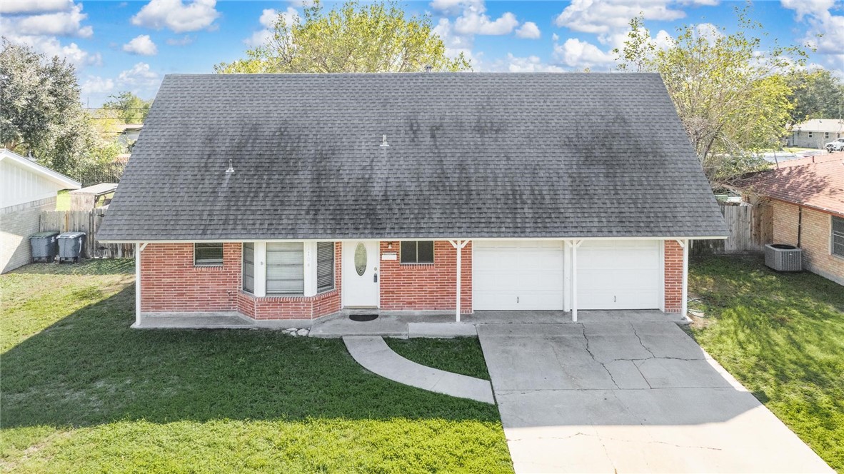 1104 Polaris Drive Portland, TX 78374 - Photo 2 of 39 a view of front door of house and yard