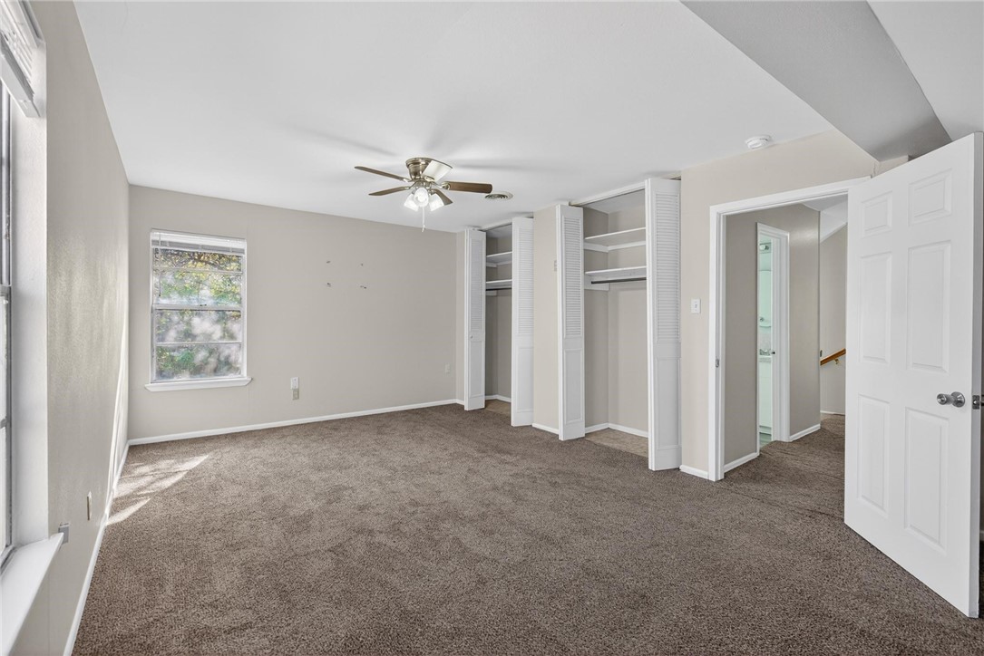 1104 Polaris Drive Portland, TX 78374 - Photo 23 of 39 an empty room with windows and closet