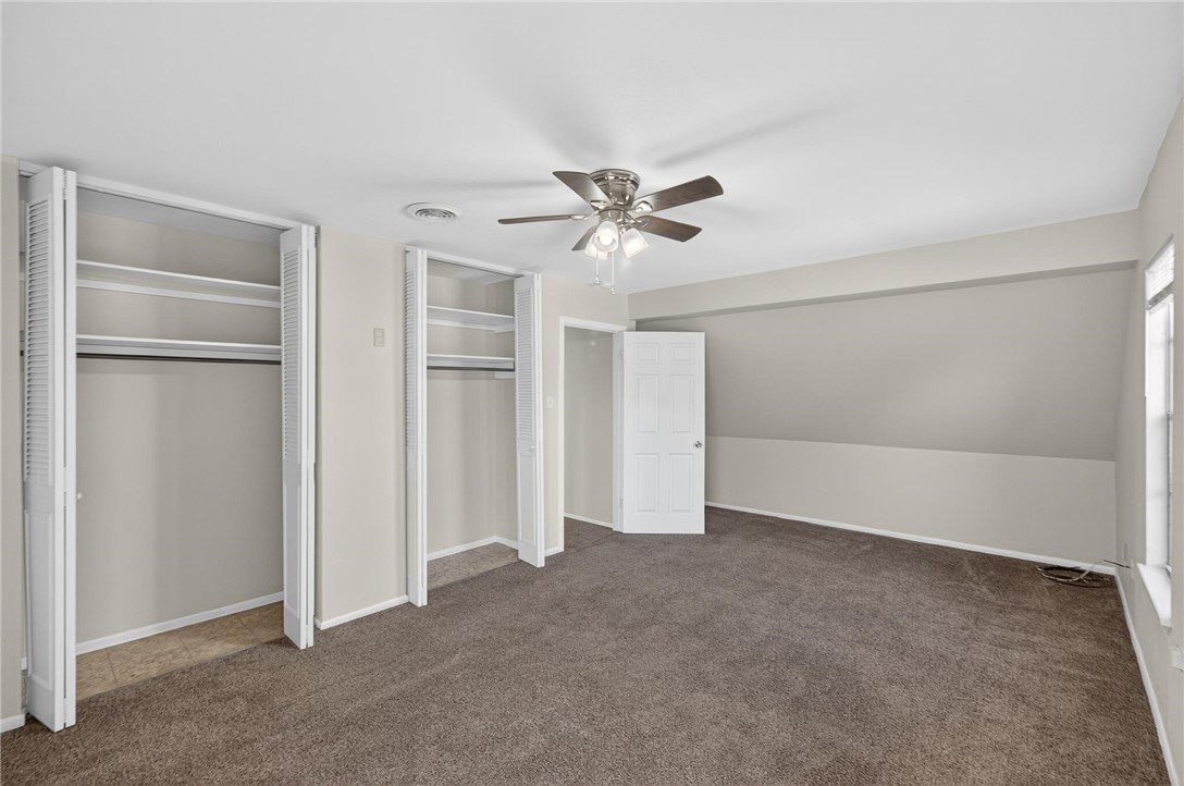 1104 Polaris Drive Portland, TX 78374 - Photo 25 of 39 a view of an empty room with a ceiling fan