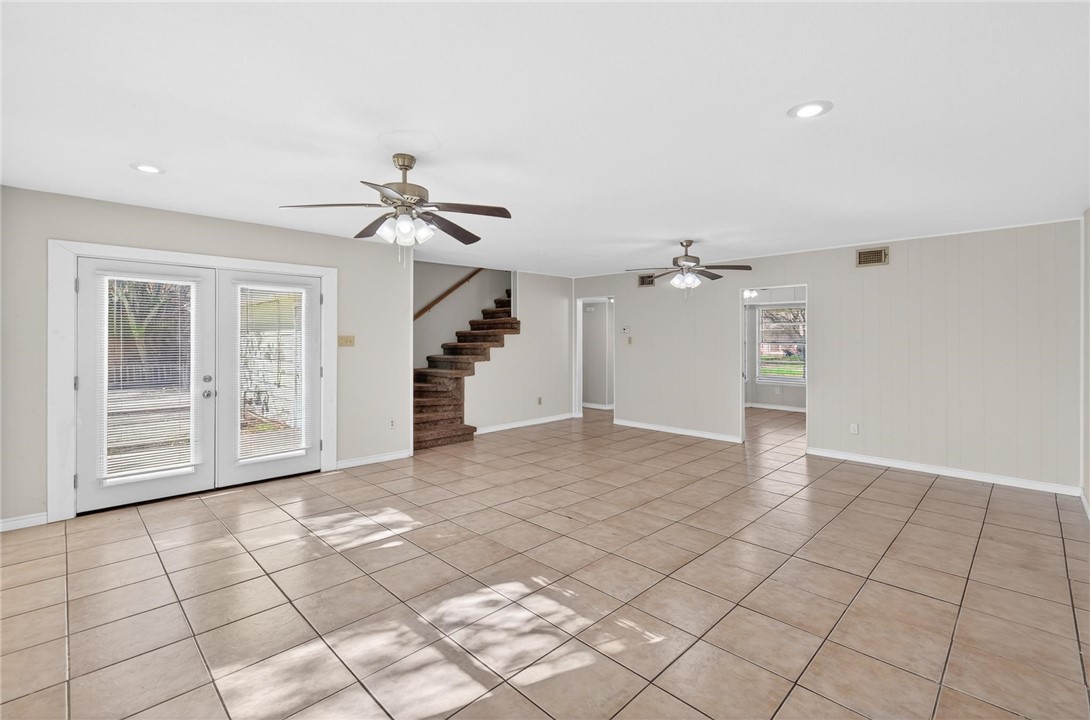 1104 Polaris Drive Portland, TX 78374 - Photo 4 of 39 a view of an empty room with a ceiling fan