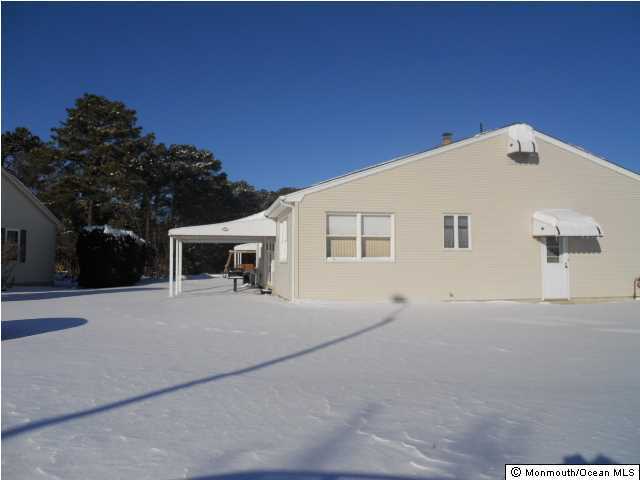 19 Oakfield Road Toms River, NJ 08757 - Photo 15 of 15 a view of a house with a outdoor space