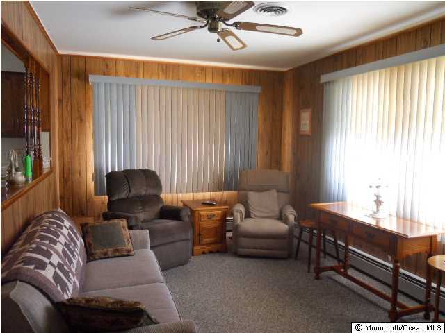 19 Oakfield Road Toms River, NJ 08757 - Photo 6 of 15 a living room with furniture and a large window