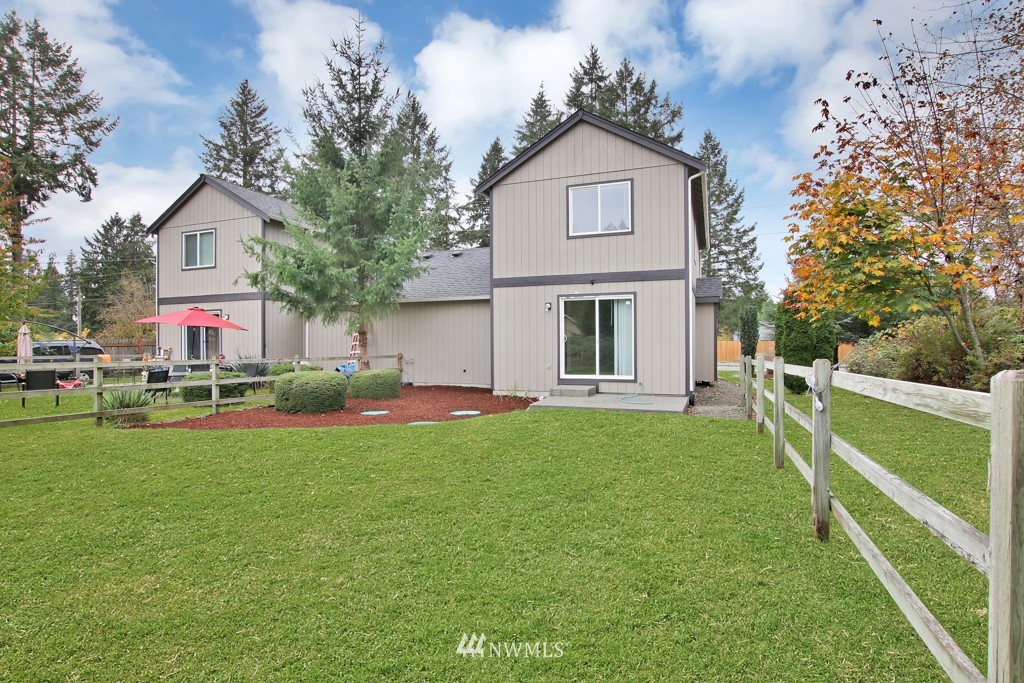 15925 Spanaway Loop Road South Spanaway, WA 98387 - Photo 14 of 14 a front view of house with yard and green space