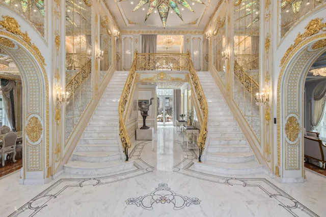 a view of a living room with a fireplace