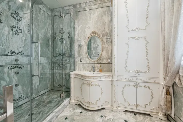 a bathroom with a shower and a mirror