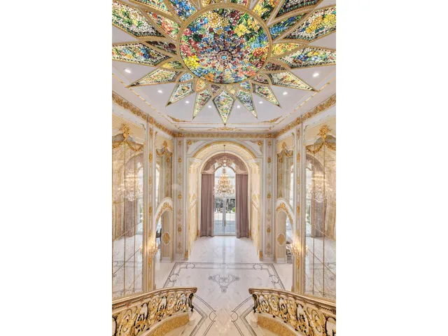 a car parked in front of a white house