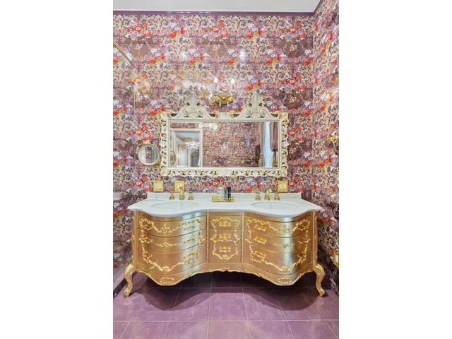 a living room with furniture chandelier and a large window