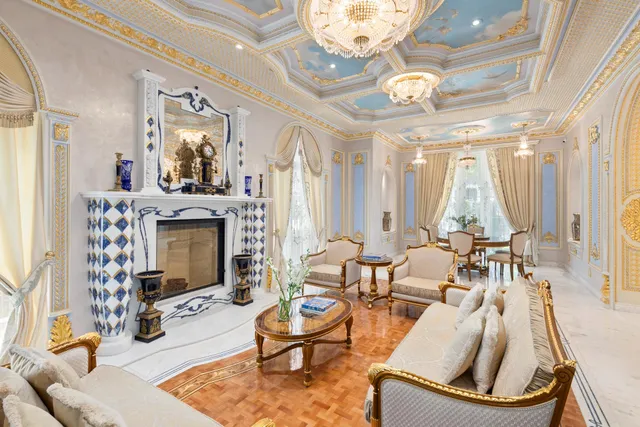 a very nice looking dining room with a large window