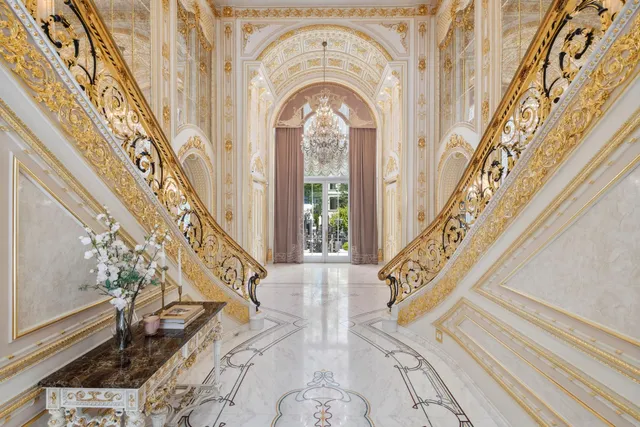 a view of a living room with a fireplace