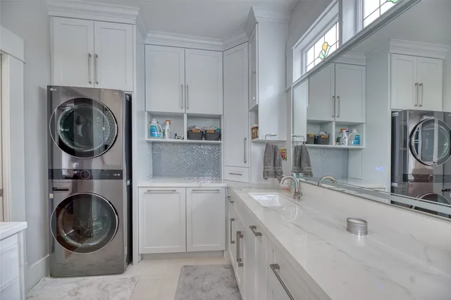 a view of a house with swimming pool and sitting area