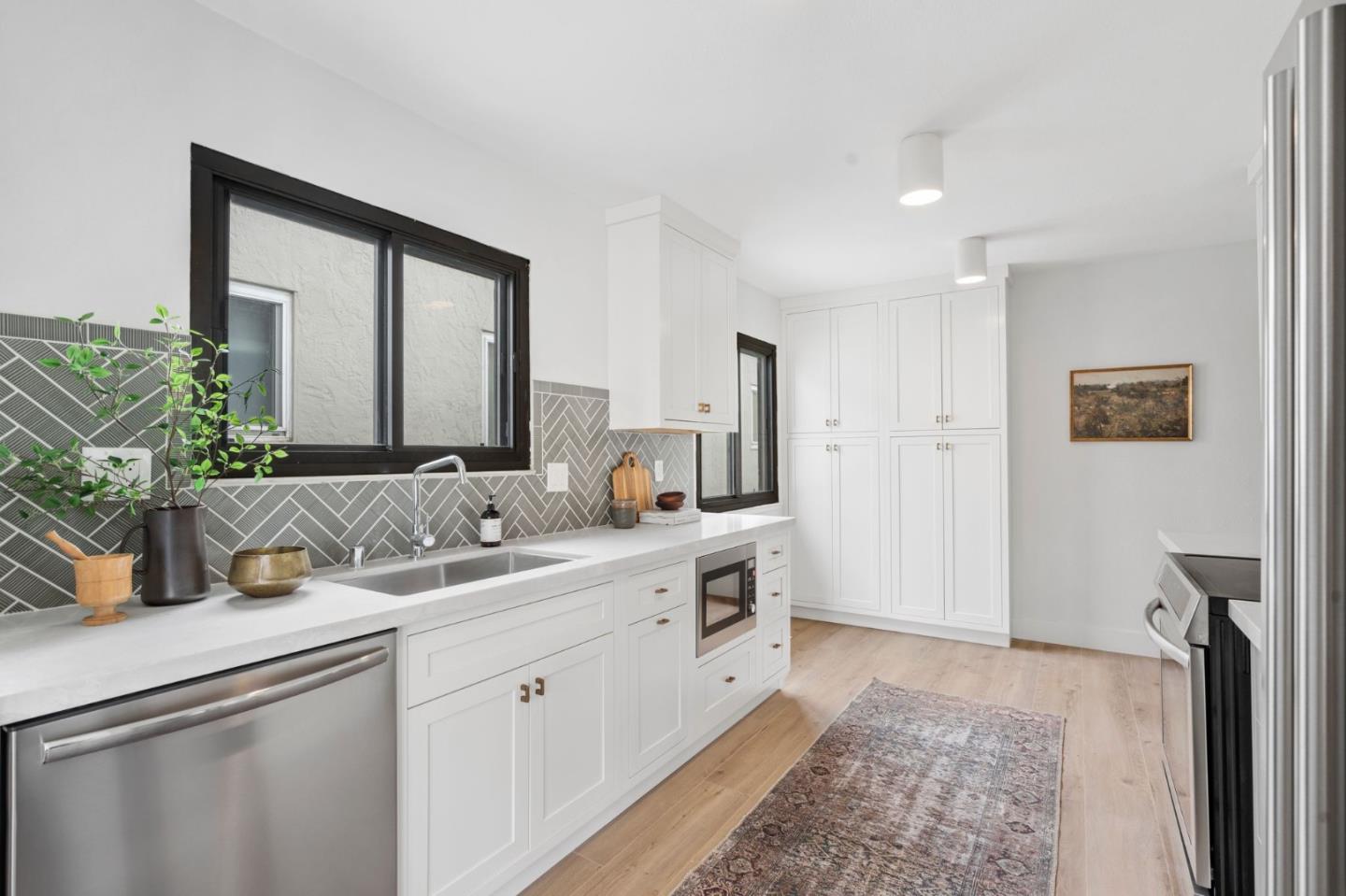 289 Dennis Drive Daly City, CA 94015 - Photo 15 of 45 a bathroom with a double vanity sink and a mirror