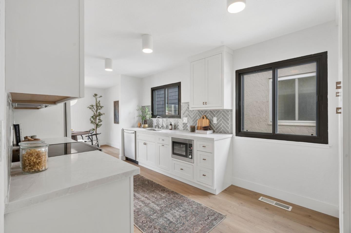 289 Dennis Drive Daly City, CA 94015 - Photo 16 of 45 a kitchen with a stove a sink and a refrigerator