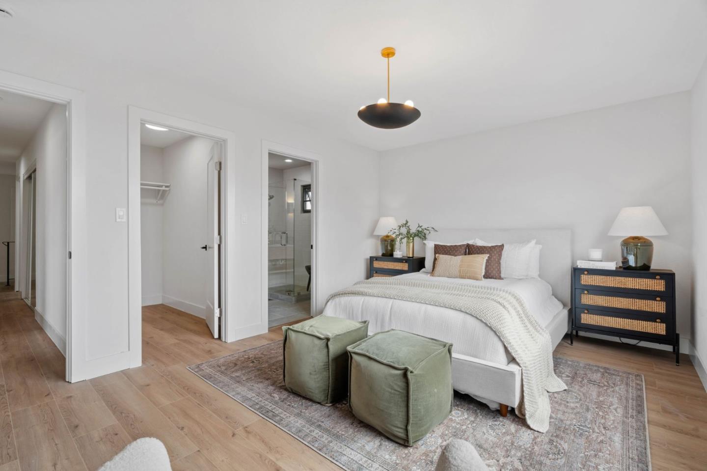 289 Dennis Drive Daly City, CA 94015 - Photo 18 of 45 a bedroom with a bed and a chandelier