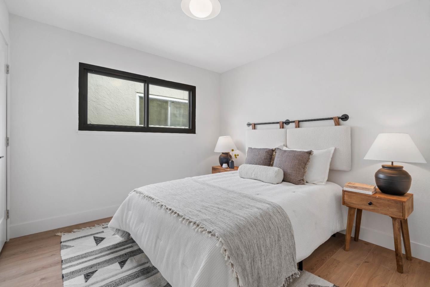 289 Dennis Drive Daly City, CA 94015 - Photo 21 of 45 a bedroom with bed and night stand