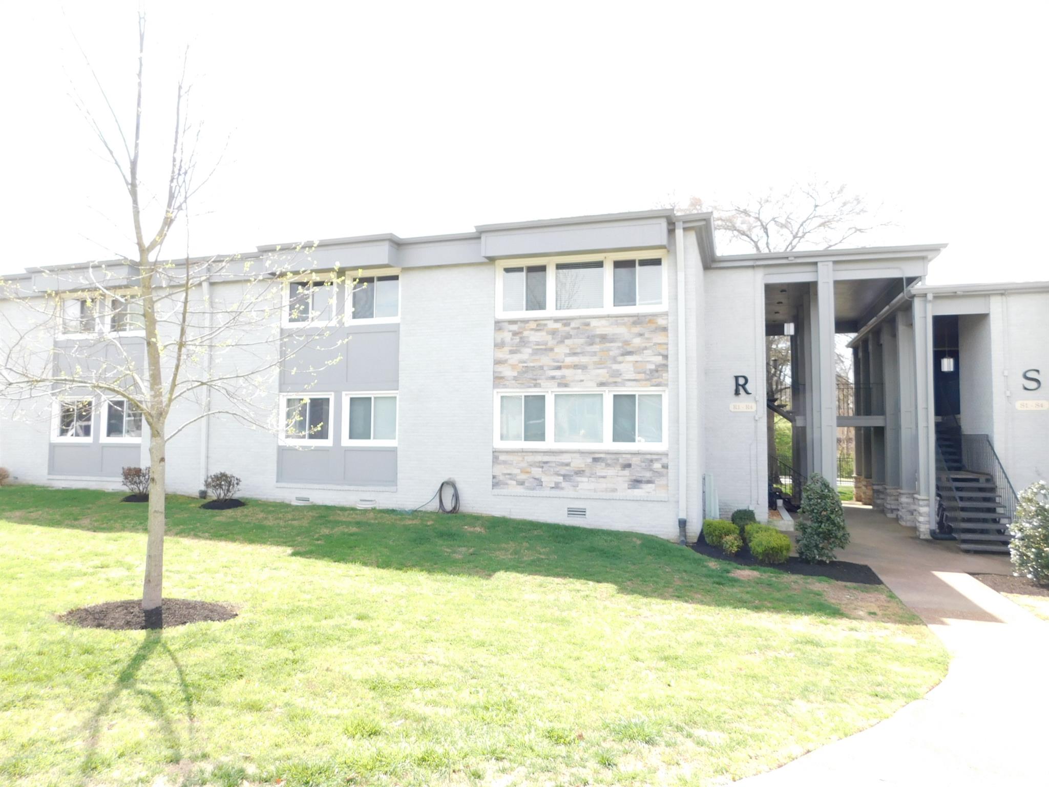 1900 Richard Jones Road, Unit R4 Nashville, TN 37215 - Photo 2 of 13 a view of a house with a swimming pool