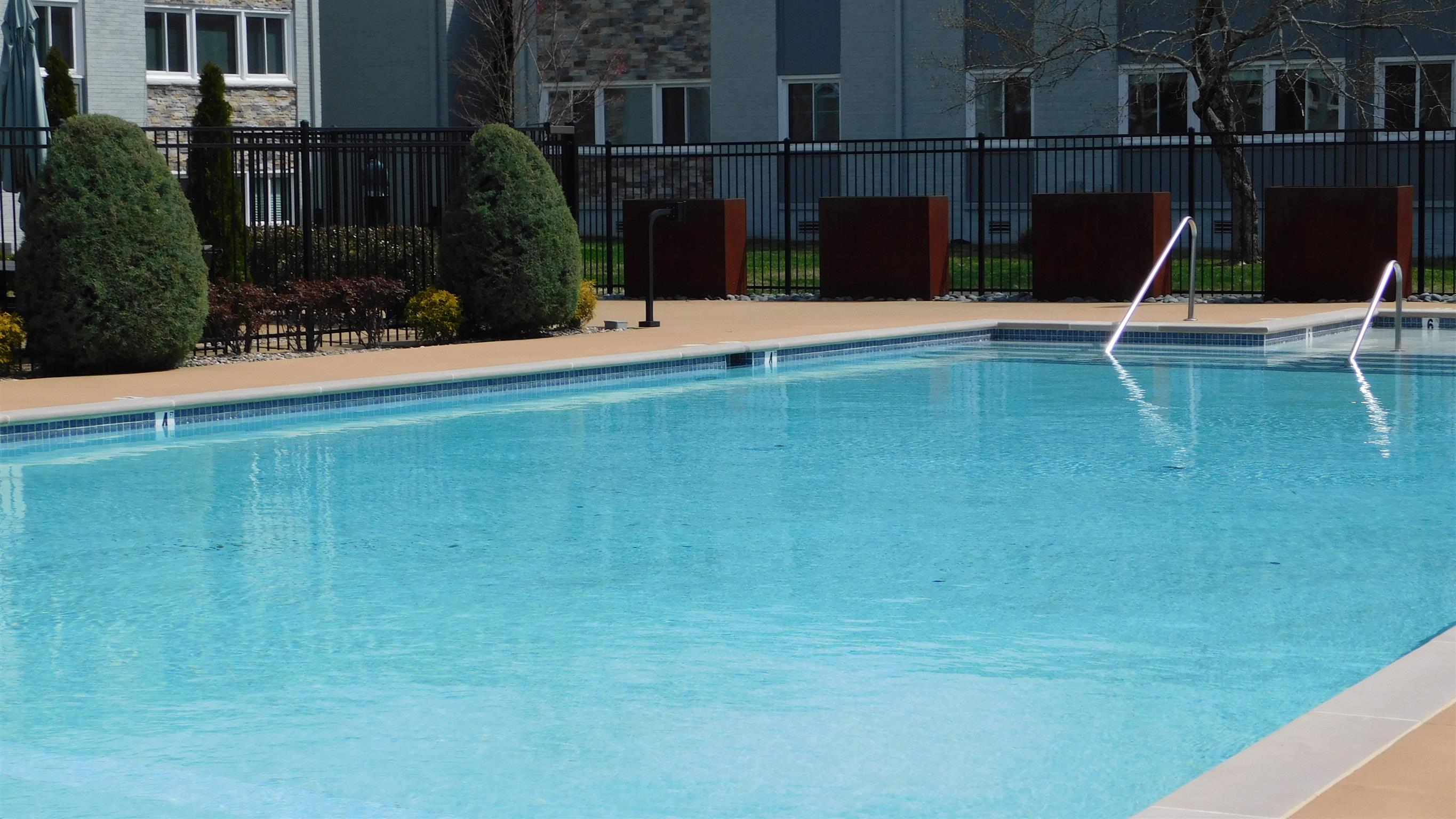 1900 Richard Jones Road, Unit R4 Nashville, TN 37215 - Photo 3 of 13 a view of a swimming pool with a patio