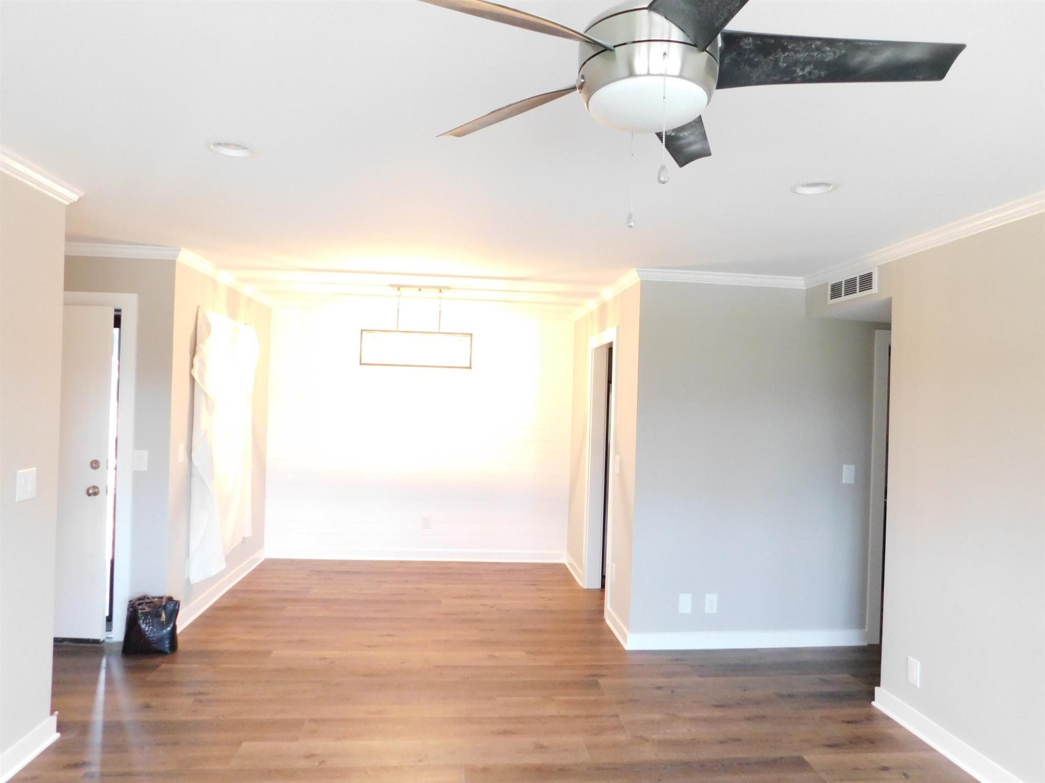 1900 Richard Jones Road, Unit R4 Nashville, TN 37215 - Photo 10 of 13 a view of empty room with wooden floor