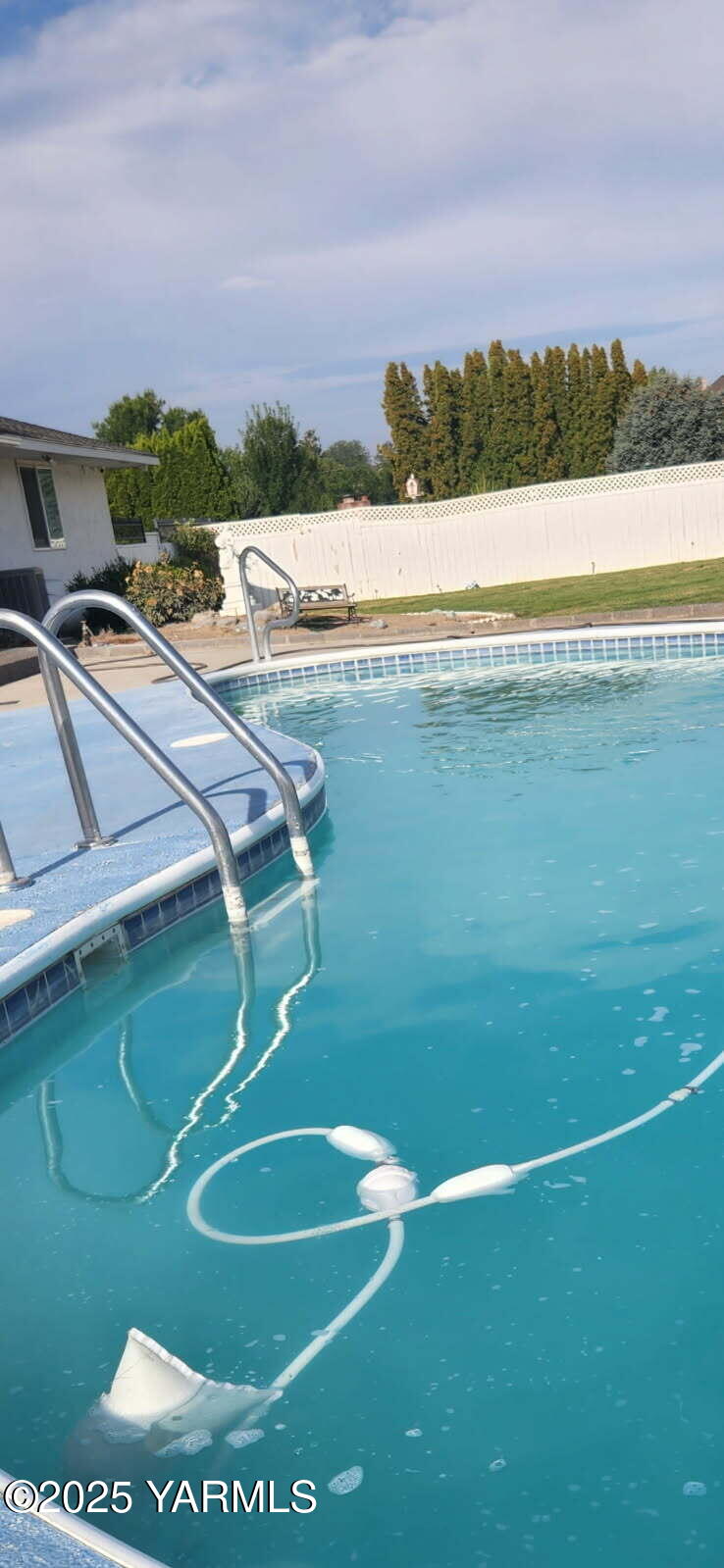 5503 Norman Road Yakima, WA 98901 - Photo 32 of 35 a view of a swimming pool and an outdoor seating