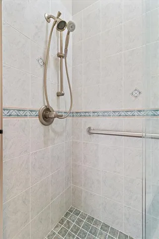 a utility room with cabinets washer and dryer