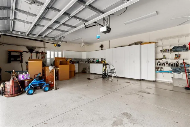 a living room with furniture a dining table and chairs