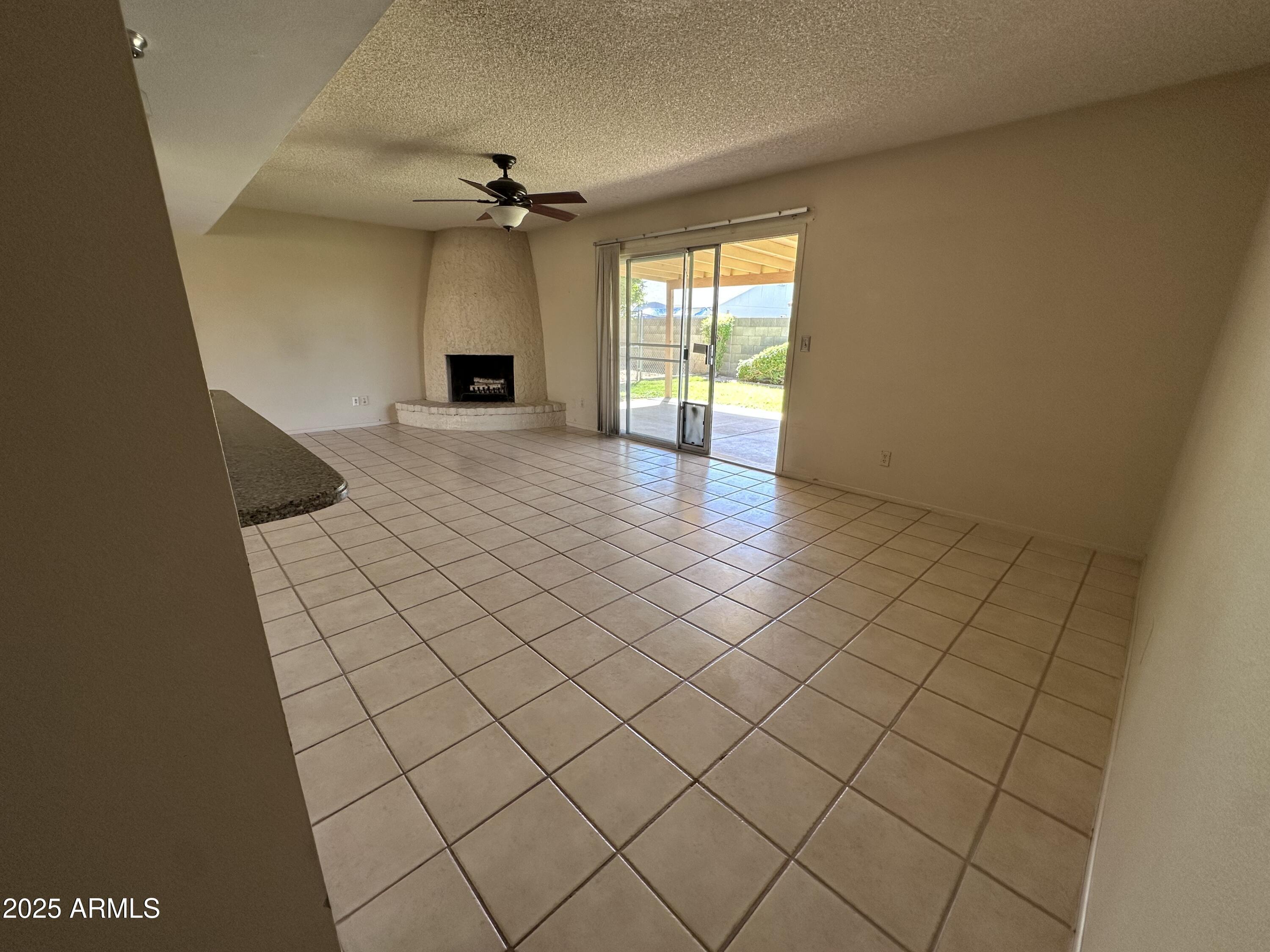 5507 West Hearn Road Glendale, AZ 85306 - Photo 16 of 19 a view of a room with a ceiling fan and window