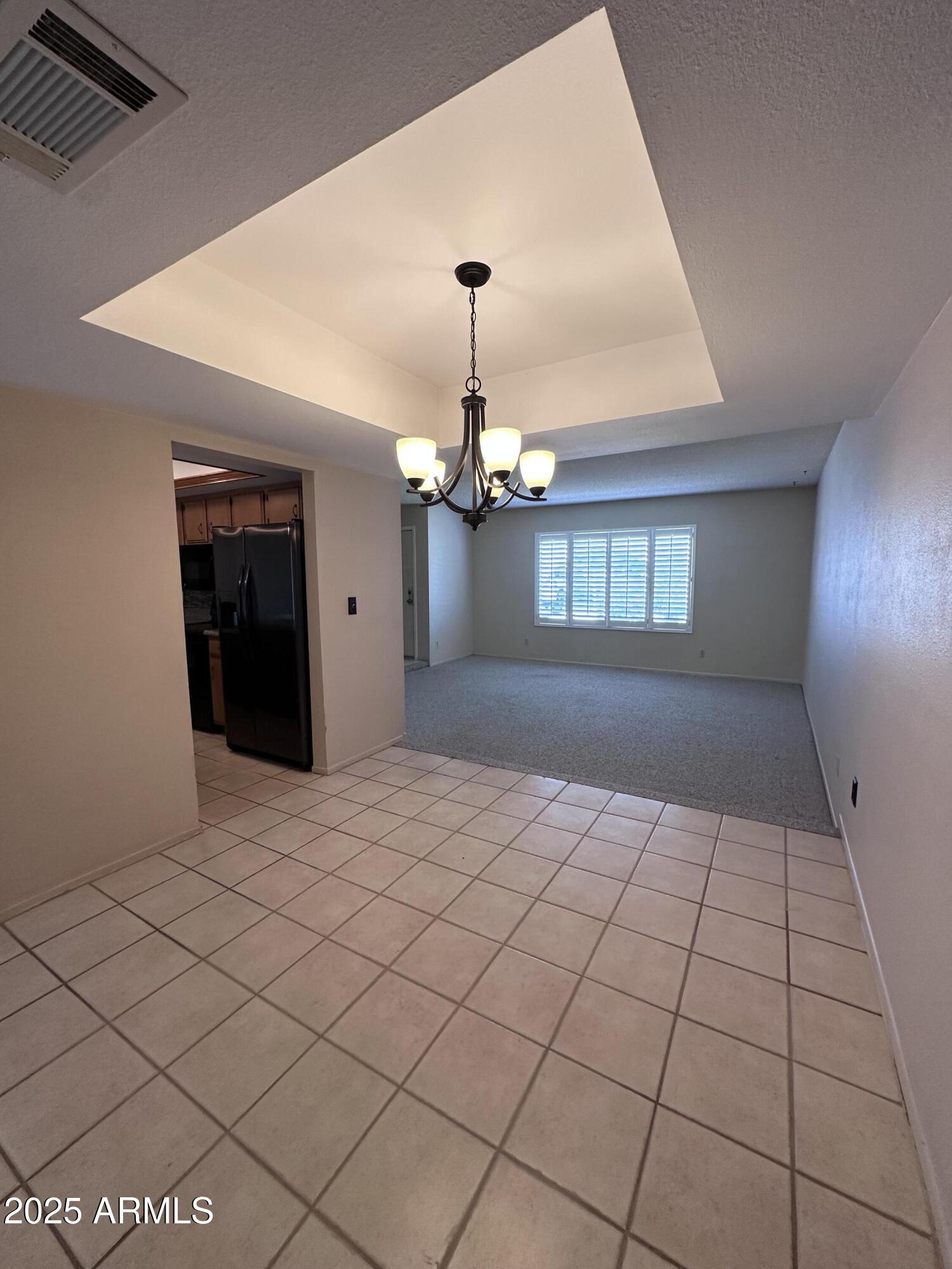 5507 West Hearn Road Glendale, AZ 85306 - Photo 6 of 19 a very nice looking room with a ceiling fan