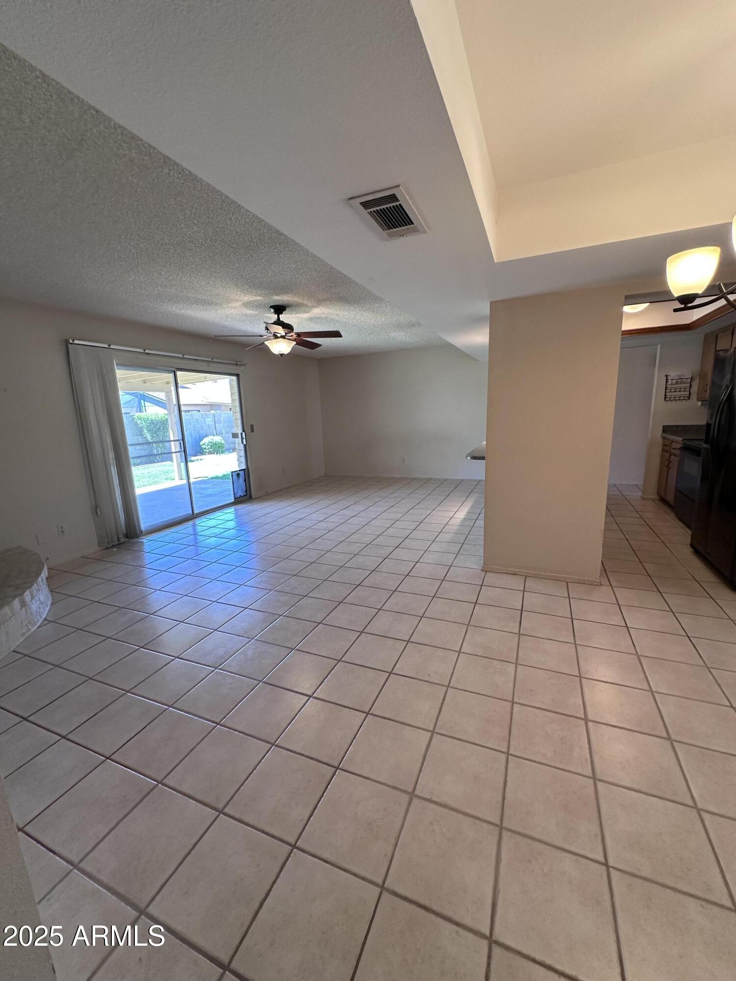 5507 West Hearn Road Glendale, AZ 85306 - Photo 7 of 19 a view of an empty room and window