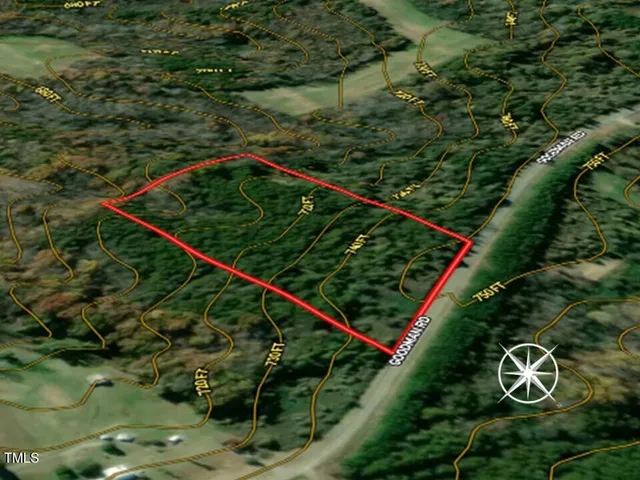 a view of a big yard next to a yard