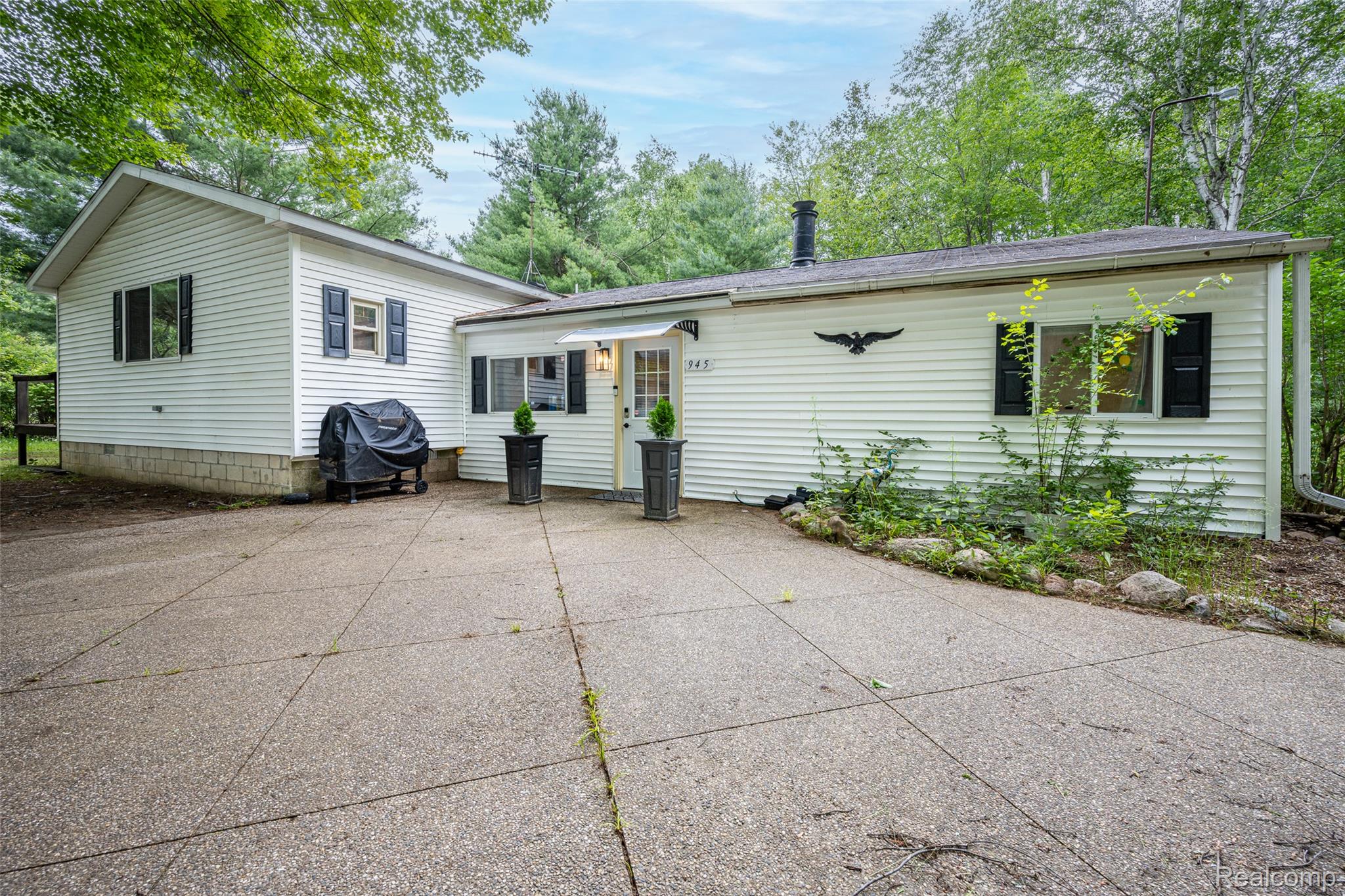945 North Hockaday Road Gladwin, MI 48624 - Photo 1 of 25 945 N Hockaday Rd in Gladwin sitting on 10 wooded acres
