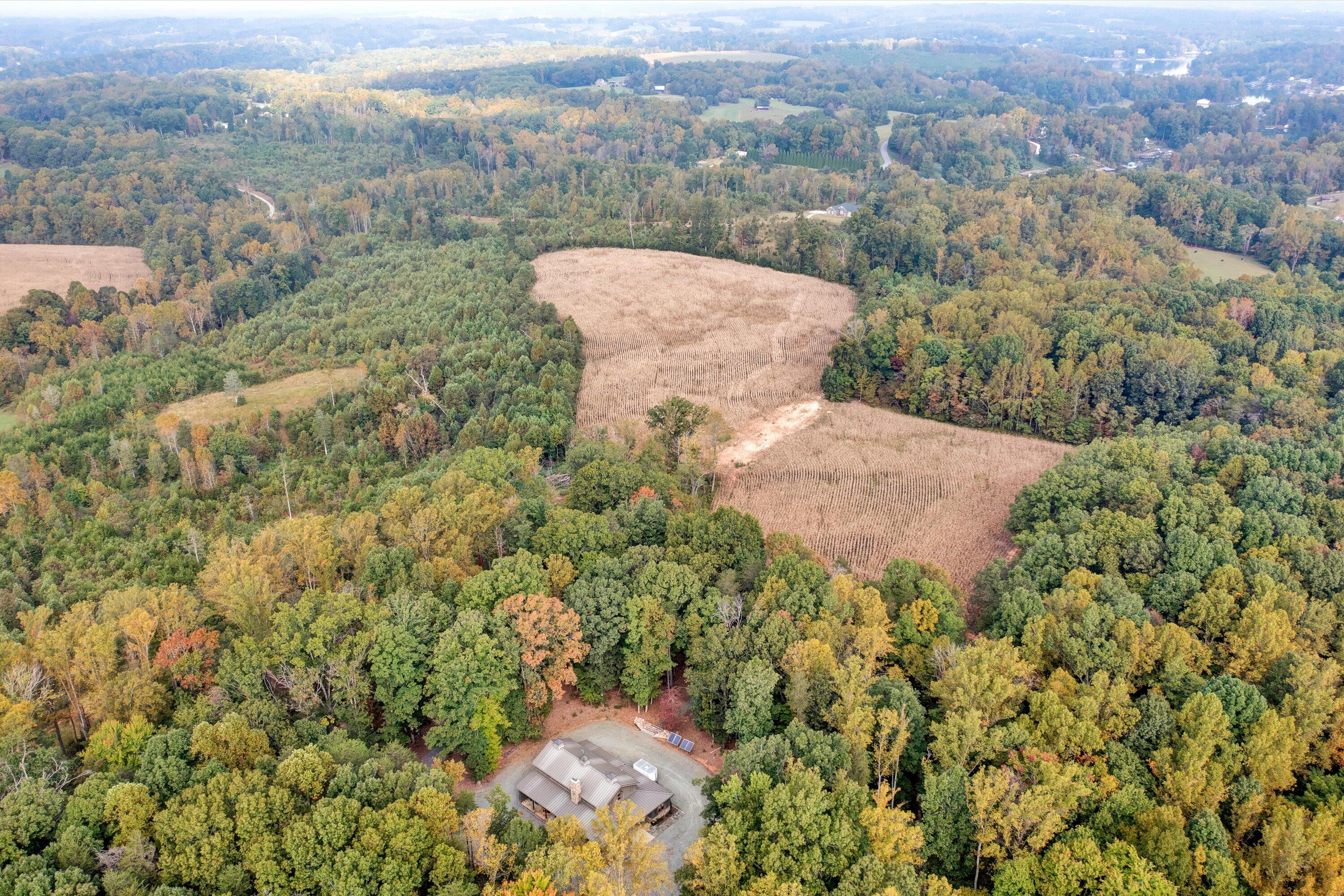 431 Standiford Road Union Hall, VA 24176 - Photo 28 of 44 an aerial view of a house with a yard and mountain view
