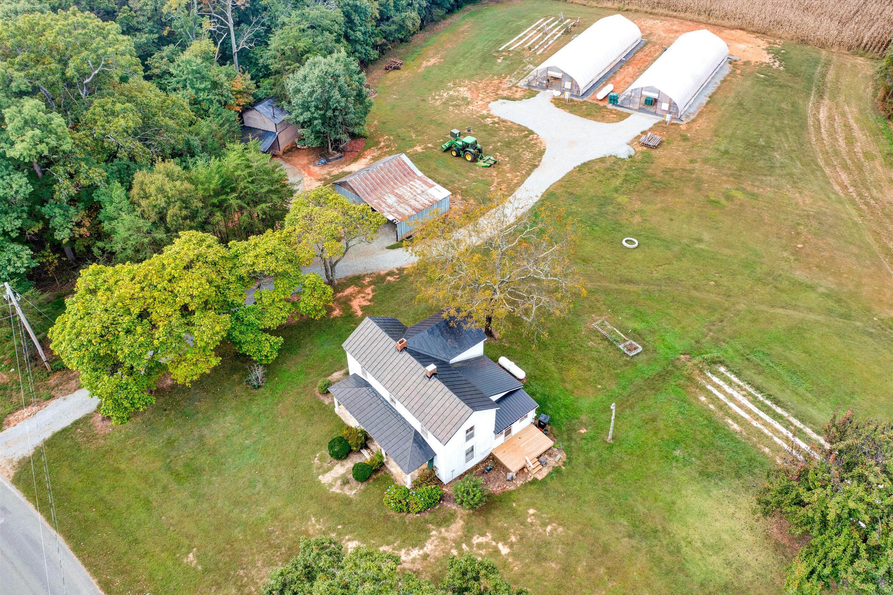 431 Standiford Road Union Hall, VA 24176 - Photo 41 of 44 an aerial view of a house with a yard basket ball court and outdoor seating