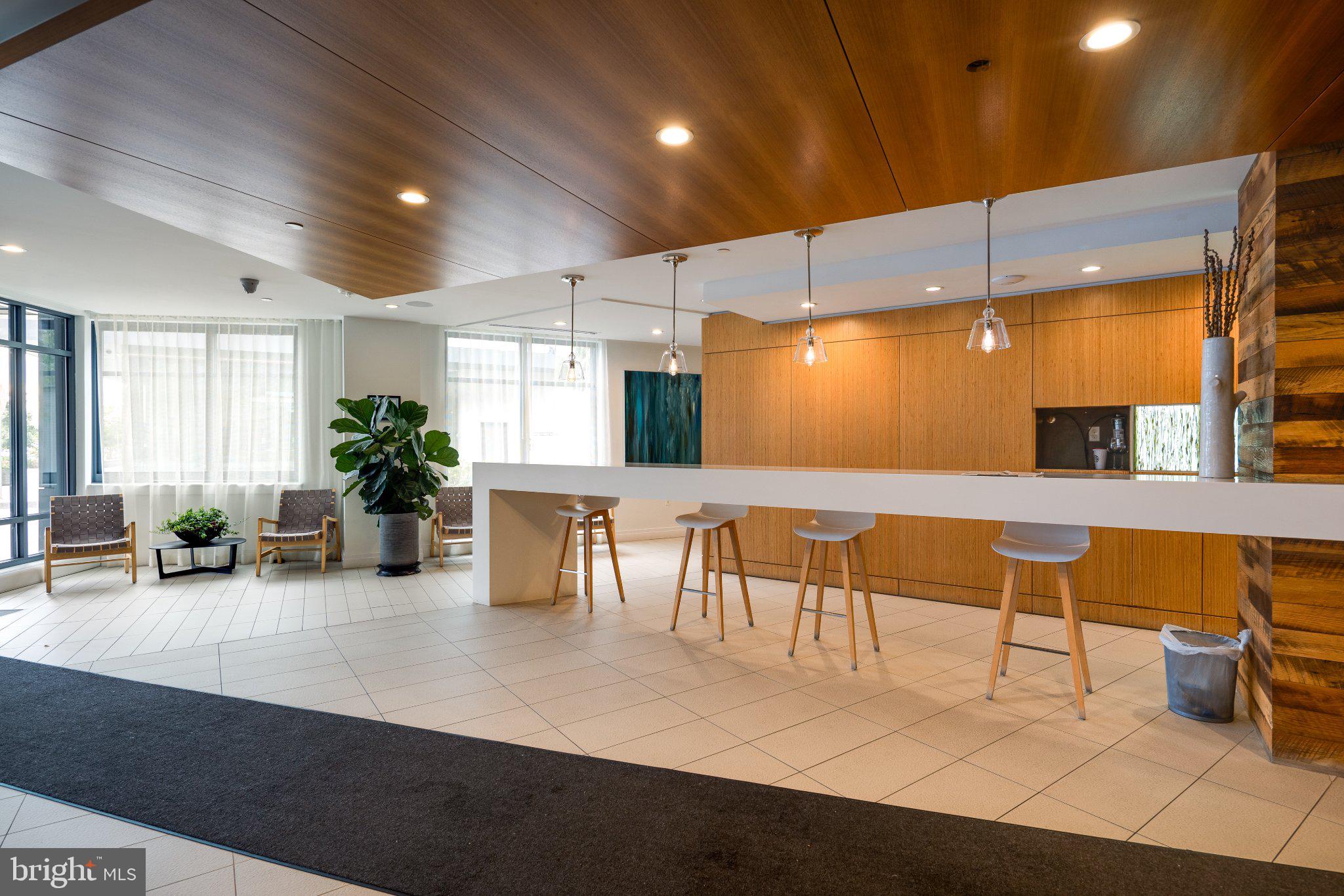 525 Southwest Water Street Southwest, Unit 404 Washington, DC 20024 - Photo 23 of 82 Modern lobby with warm wood accents.