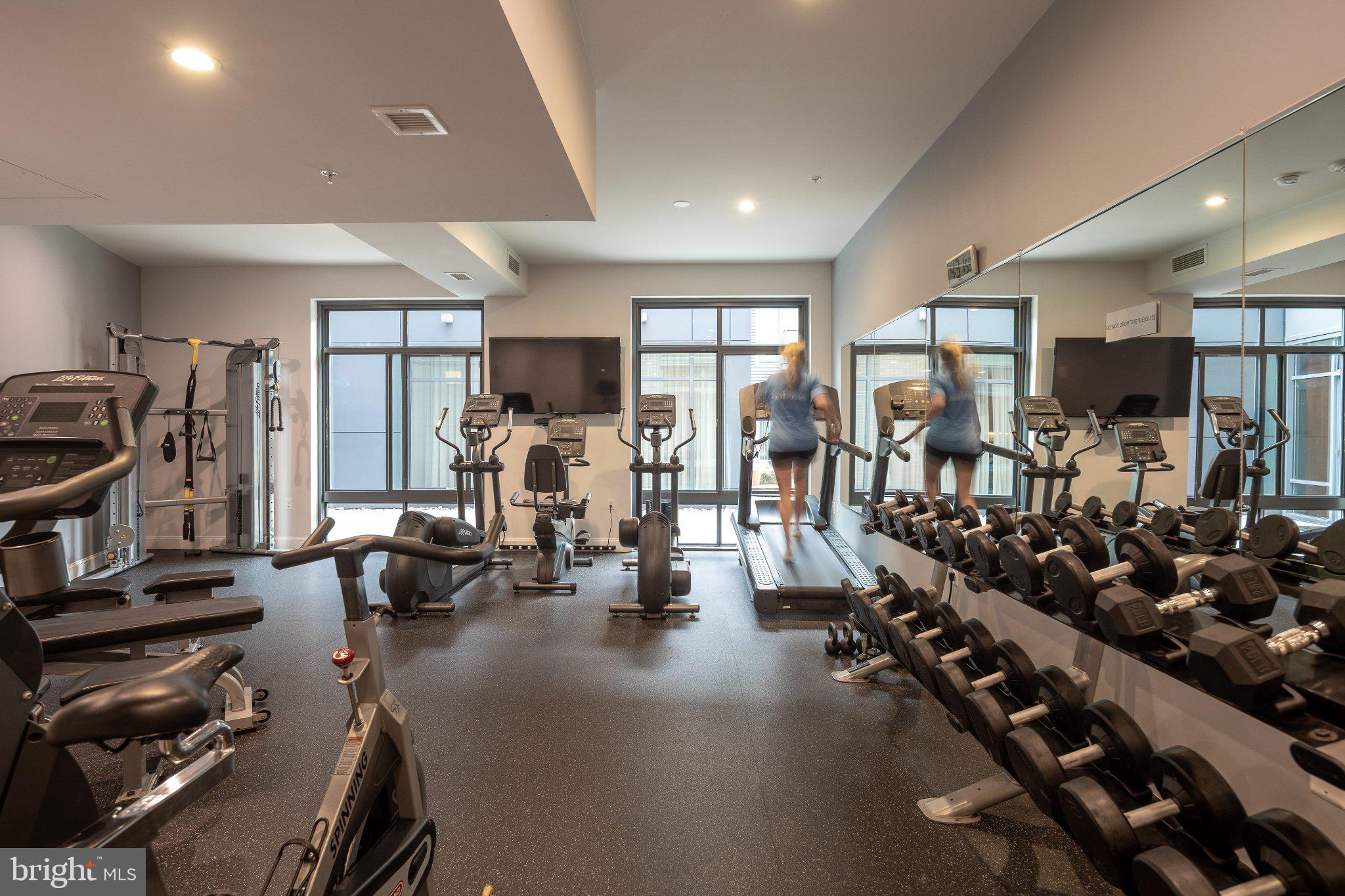 525 Southwest Water Street Southwest, Unit 404 Washington, DC 20024 - Photo 34 of 82 Modern fitness space with sleek equipment.