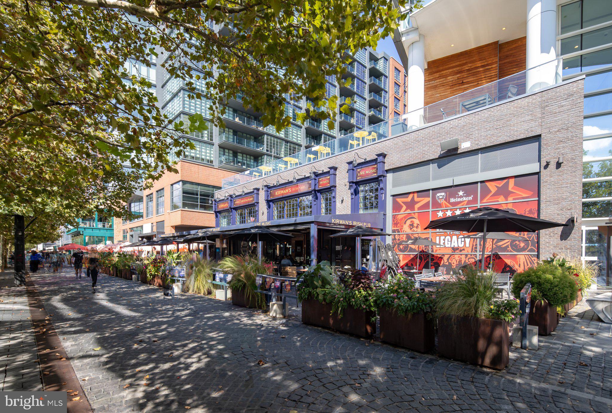525 Southwest Water Street Southwest, Unit 404 Washington, DC 20024 - Photo 64 of 82 Vibrant dining along a lively promenade.