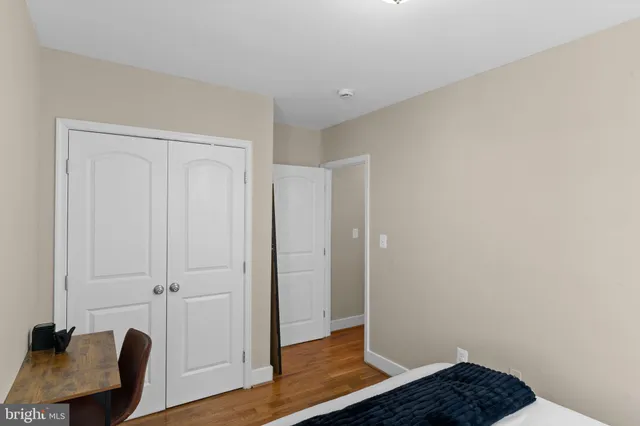 a view of bedroom with hardwood floor