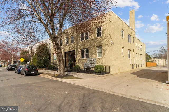 a view of a building with a street