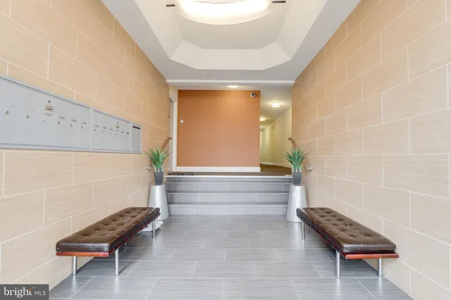 a bathroom with a toilet and a bathtub