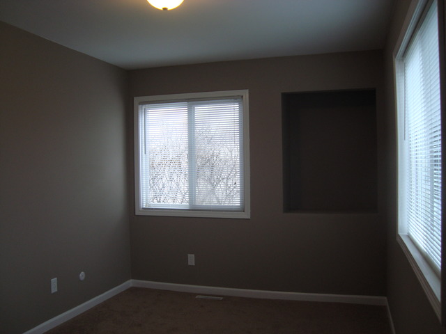 151 Heathgate Road Montgomery, IL 60538 - Photo 15 of 23 a view of an empty room with a window