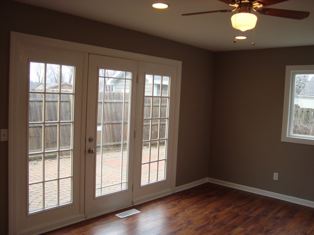 151 Heathgate Road Montgomery, IL 60538 - Photo 9 of 23 a view of an empty room with wooden floor and a window