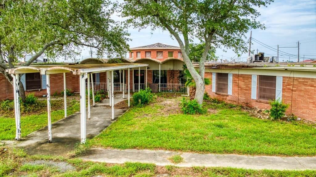 1201 Gregory Street Taft, TX 78390 - Photo 1 of 5 a front view of a house with a yard