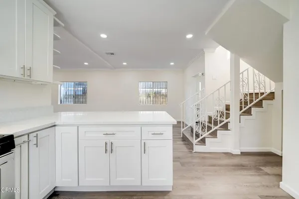 a view of an entryway with stairs