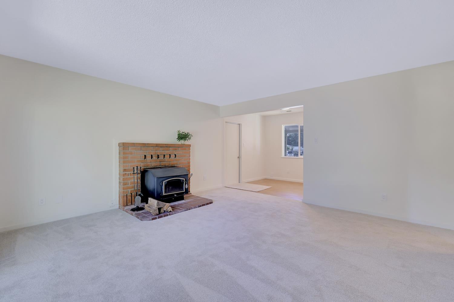 10673 Alta Street Grass Valley, CA 95945 - Photo 16 of 38 a living room with a fireplace