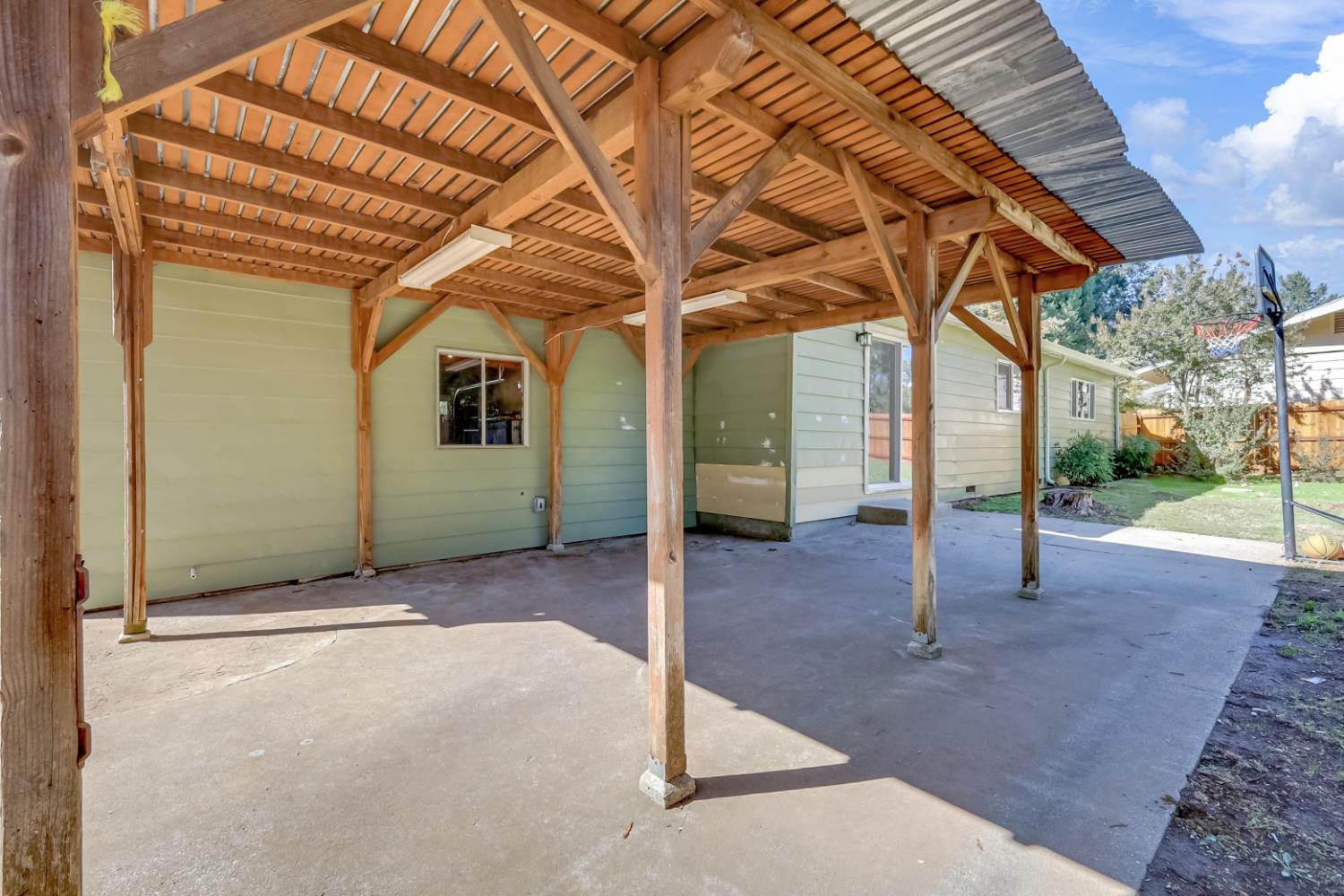 10673 Alta Street Grass Valley, CA 95945 - Photo 30 of 38 a view of a house with a porch